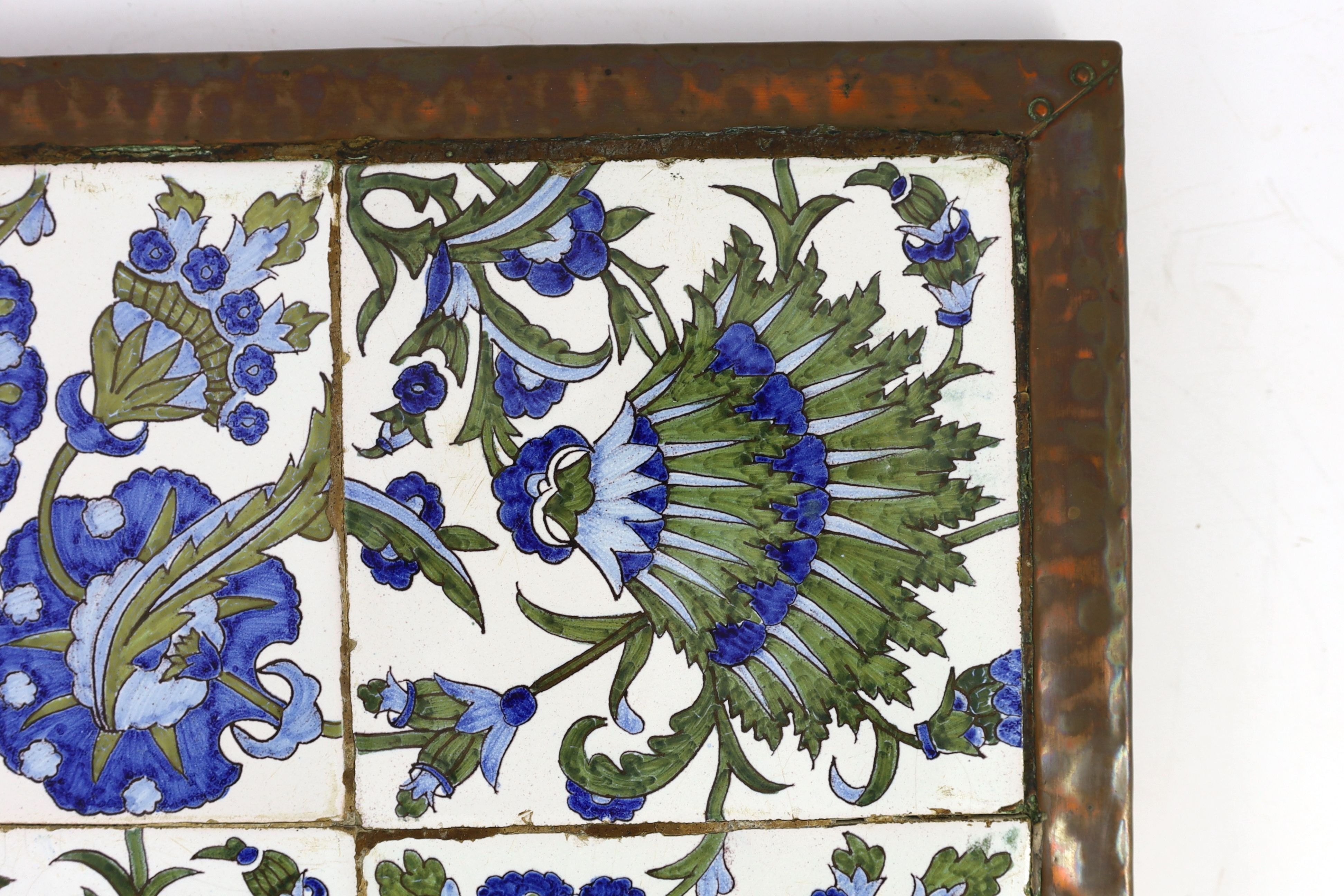 An Arts and Crafts de Morgan style 4 tile panel - 36 x 36cm